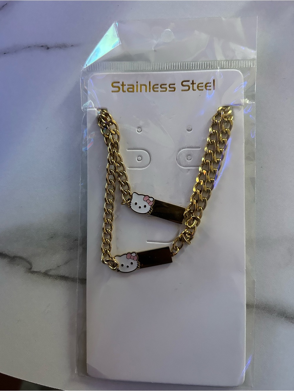 & Other Stories Gold-tone Double Chain Bracelet with White Hello Kitty Accents